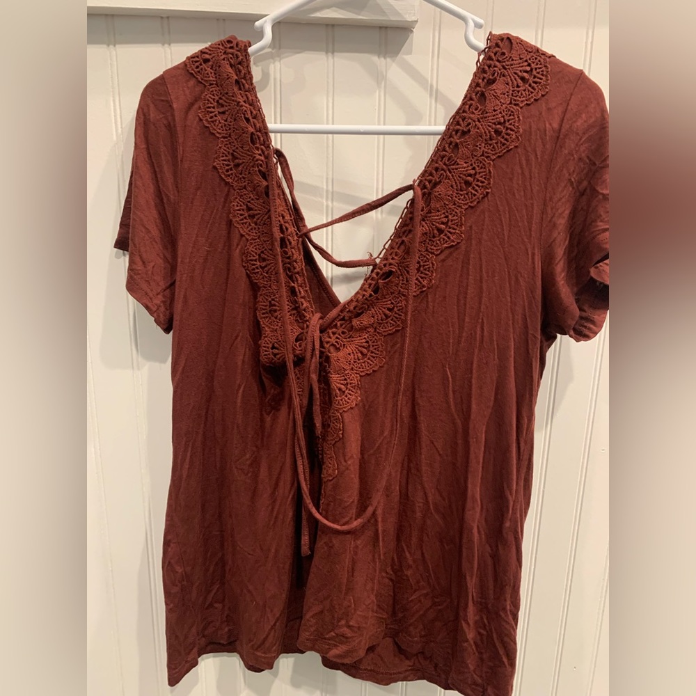 Womens Day Trip open back short sleeve shirt.